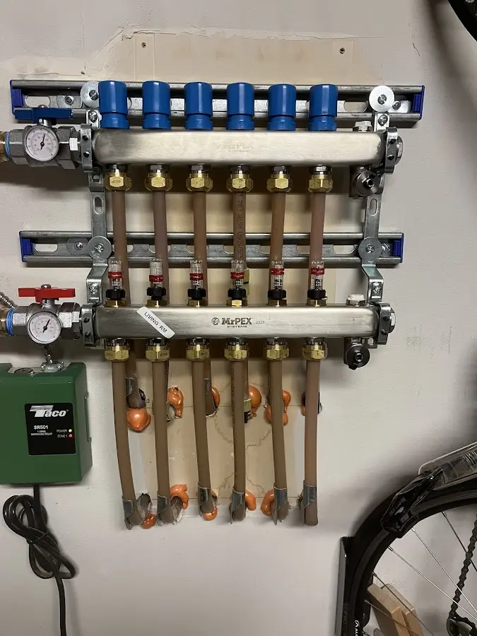 Plumber performing Leak Detection at a residential property in Plum